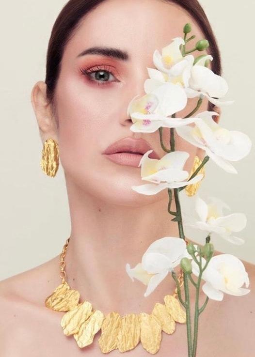 Dorra Zarrouk - golden leaf earrings