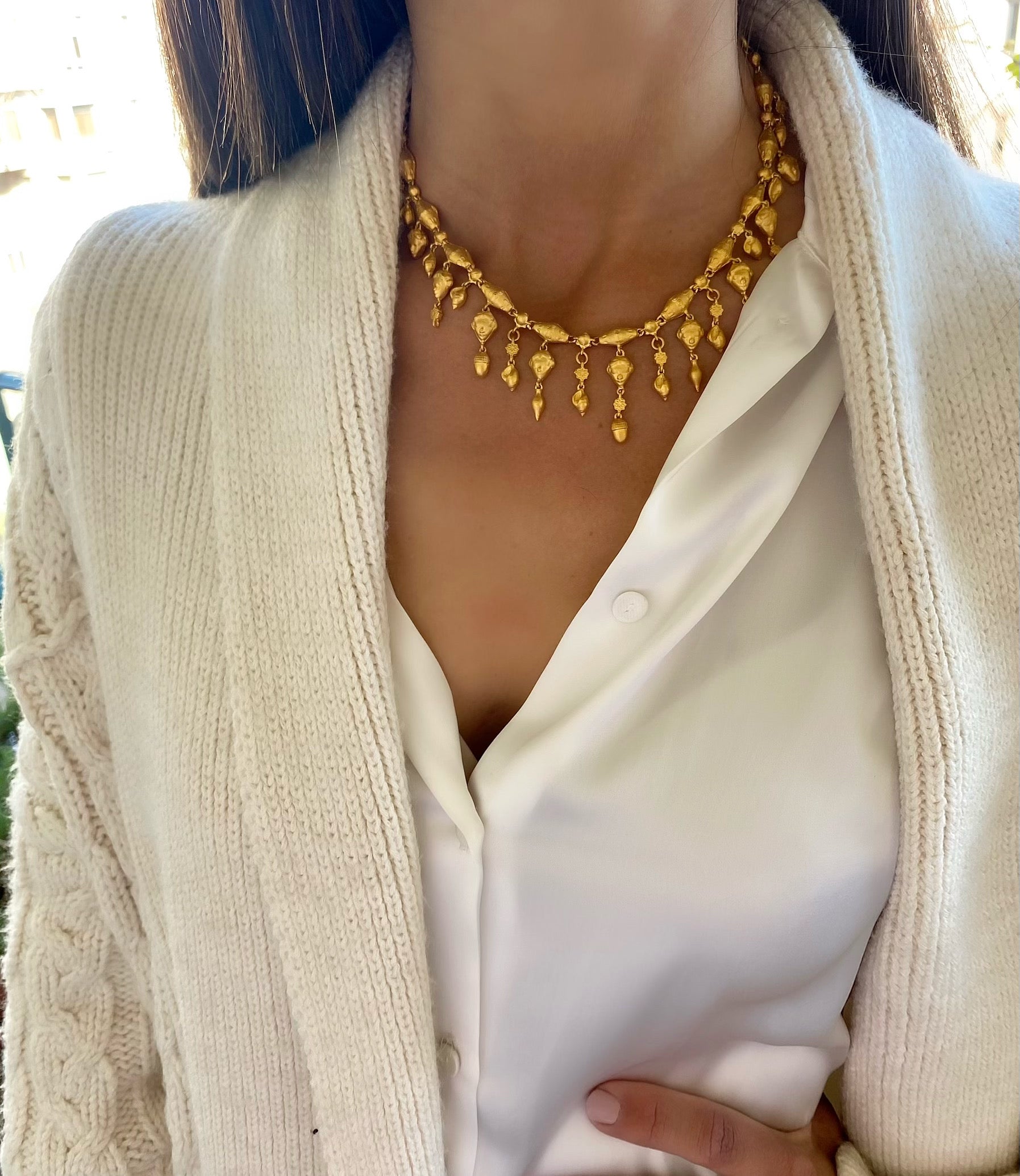 Face and nut necklace